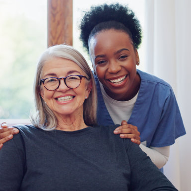 nurse and elder smiling